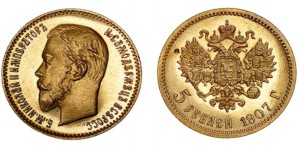 На фото - коллекционные золотые монеты